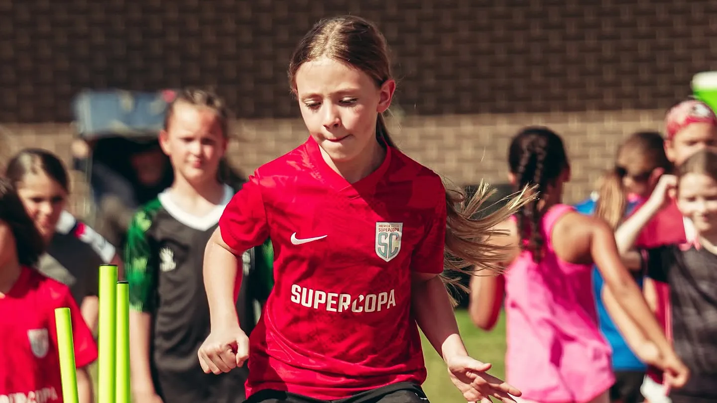 Young players sprinting during a speed drill